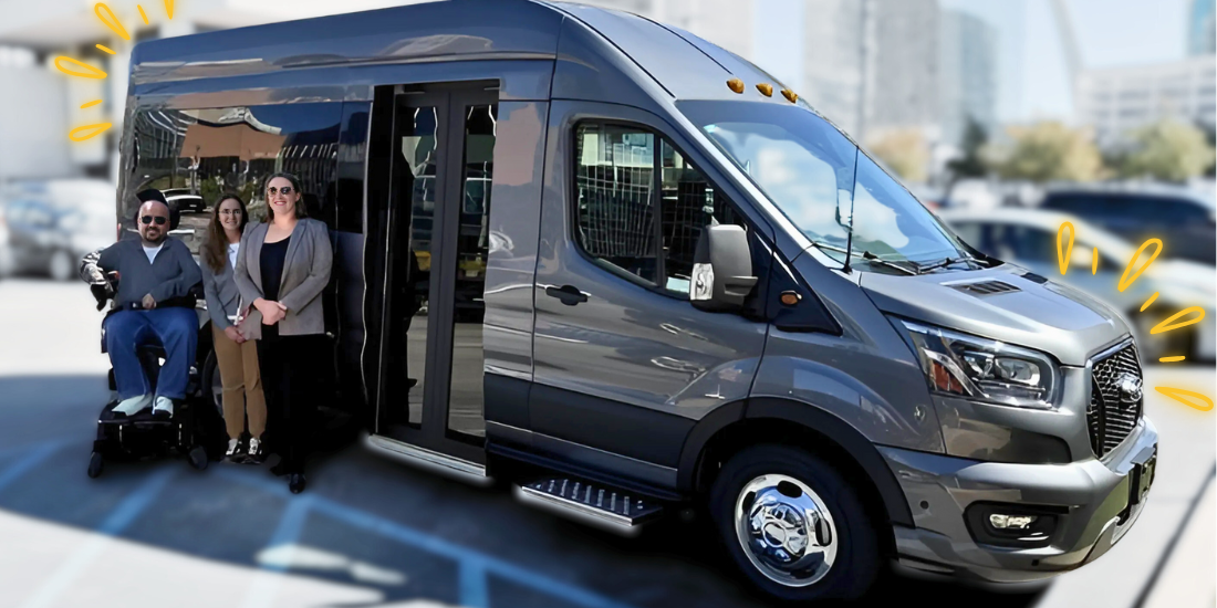 SDI team members smile in front of a brand new accessible Ford Transit van on a sunny day.