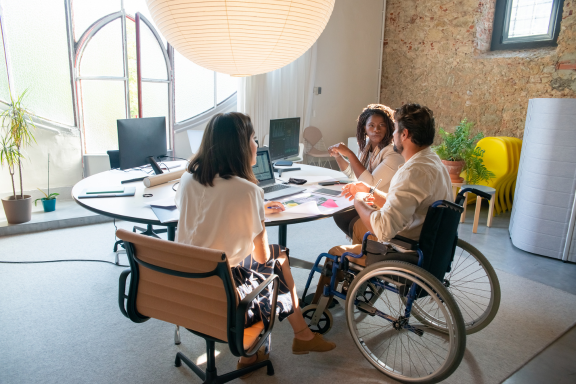 Three colleagues at a table
